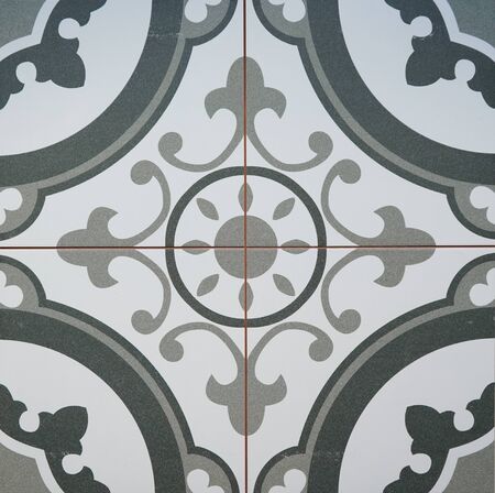 tiles with a floral geometric pattern, square shape
