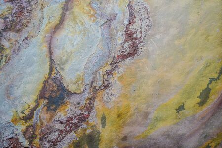 Floor and wall coverings in the form of natural stone, with yellow and red streaks for facing,...