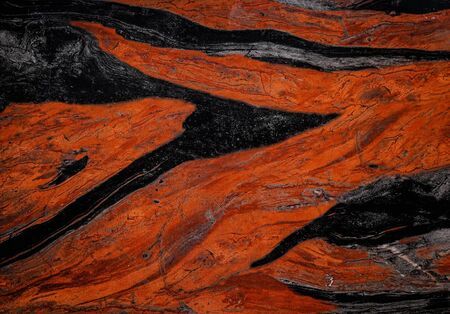 black and orange marble slab with streaks for facing, landscape, interior.