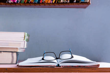 still life of books and spectacles with selective focus