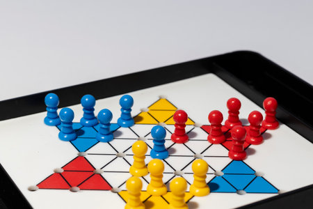 Close-up of a board game - chinese checkers on white background