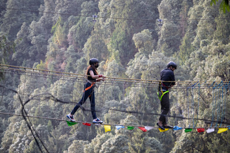 Panchpulla, Dalhousie, Himachal Pradesh, India - May 21st 2022: Tourists enjoying zip lining adventure sportのeditorial素材