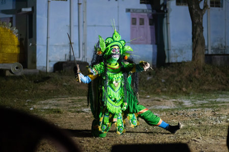 Purulia, Ayodhya hill, West Bengal, India - 14th December 2021: A performance of chhau dance wearing...