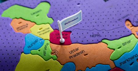 Selective focus on Dehradun - the capital city of Uttarakhand on an Indian map