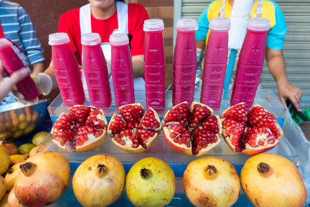pomegranate juice and pomegranate fruit, street food ,Bangkok Thailandの写真素材