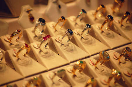 Rows of rings displayed in a jewellery shop.の写真素材