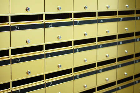 A wall of letter boxes for an apartmentの写真素材