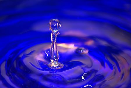 Fresh liquid concept in a blue glassの写真素材