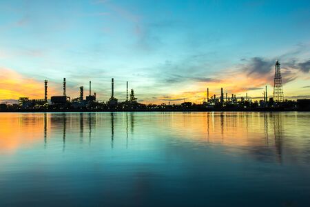Oil refinery along the river at Dusk (Bangkok, Thailand)の写真素材