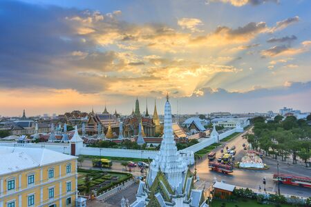 The beauty of the Emerald Buddha Temple at twilight. And while the gold of the temple catching the light. This is an important buddhist temple of thailand and a famous tourist destination.の写真素材