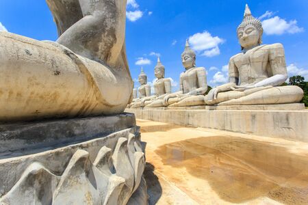 Buddha statue and blue sky, Nakhon Si Thammarat Province, Thailandの写真素材
