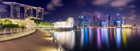 SINGAPORE-JUNE 27 2015:Landscape of the Singapore financial district and business building at night life view.のeditorial素材