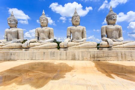 Buddha statue and blue sky, Nakhon Si Thammarat Province, Thailandの写真素材