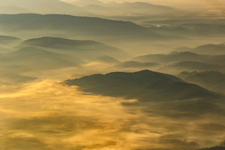 Layer of mountains and mist at sunrise time, Landscape at Doi Luang Chiang Dao, High mountain in Chiang Mai Province, Thailandの写真素材