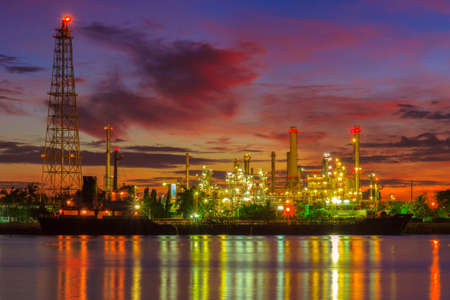 Oil refinery along the river at Dusk (Bangkok, Thailand)の写真素材