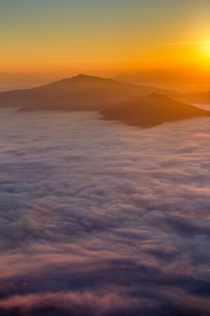 Landscape with the mist at Pha Tung mountain in sunrise time, Chiang Rai, Thailand.の写真素材