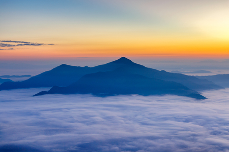 Landscape with the mist at Pha Tung mountain in sunrise time, Chiang Rai, Thailand.の写真素材