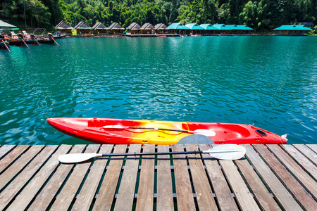 Canoe in a beautiful mountains lake forest and river natural attractions in Ratchaprapha Dam at Khao...