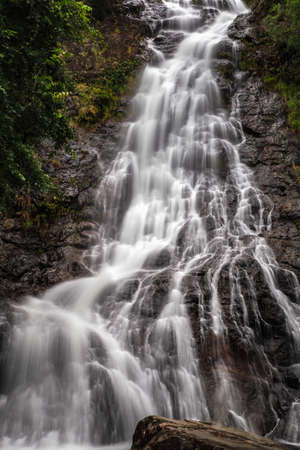 Beautiful natural Sarika waterfall with rocks in the foreground at Khao Yai National Park, Nakhon...