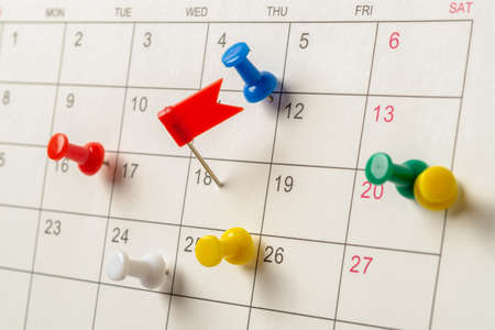 The concept of planning and deadline with push pin on calendar dateの写真素材