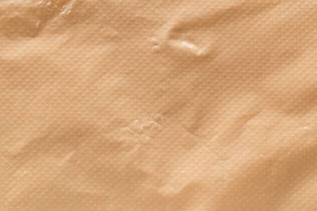 Brown eco recycled plastic bag texture background.