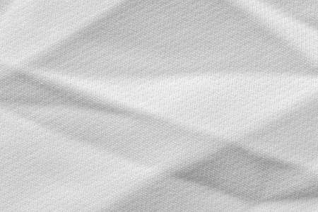 Fabric background with a white fabric cloth polyester texture.の写真素材