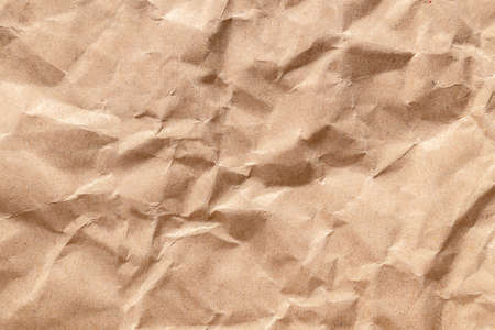 Brown eco recycled kraft paper sheet texture cardboard background.