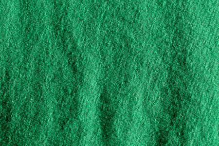 Green color fabric cloth polyester texture and textile background.の写真素材