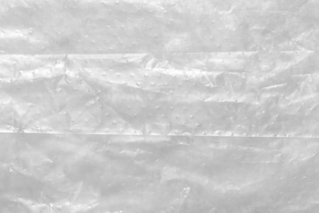 Close up of plastic foil background, Abstract background of a white color made of paper.の写真素材