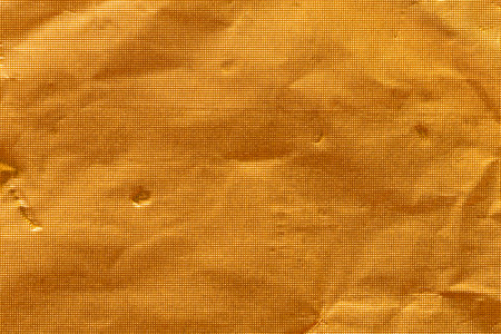Gold paper sheet texture cardboard background.の写真素材
