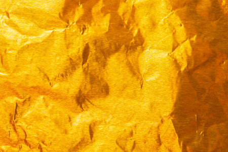 Gold paper sheet texture cardboard background.