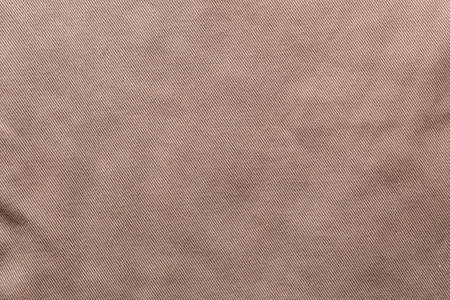 Close-up of the fabric background and gray color denim texture.