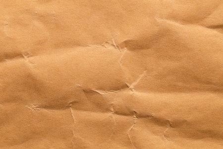 Brown color eco recycled kraft paper sheet texture cardboard background.の写真素材
