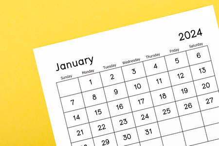 Calendar Desk 2024: January is the month for the organizer to plan and deadline with a yellow background.の写真素材