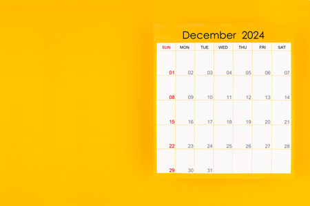 December 2024 caledar page on yellow color background, Position with copy space.の写真素材