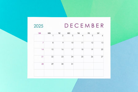 December calendar card for 2025 year on colorful background. Flat lay.