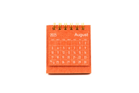 August 2025. Front view of mini desk calendar on white background.の写真素材