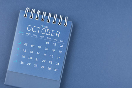 October 2026 calendar on blue color background. Desk calendar for planning and organizing.の写真素材