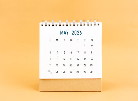 May 2026 desk calendar on yellow color background, Front view.の写真素材