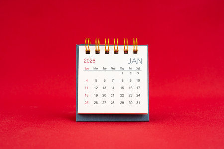 January Mini calendar for 2026 year on red color background.の写真素材