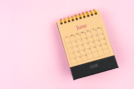 June 2026 desk calendar on pink color background, Position with copy space.の写真素材