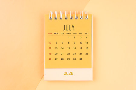 July 2026 desk calendar on the yellow, planning for business meeting concept.の写真素材