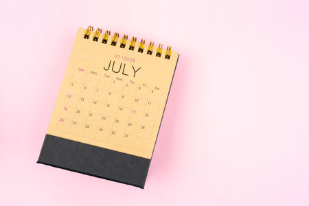 Brown calendar for July 2026 on pink background, Planning concept.の写真素材