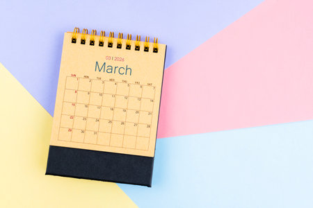 March 2026 desk calendar on colorful background, Position with empty space.