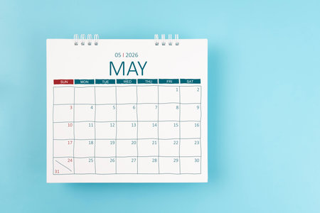May 2026 Monthly desk calendar for 2026 year on blue background. Flat lay.の写真素材