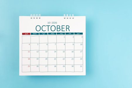 October 2026 Monthly desk calendar for 2026 year on blue background. Flat lay.の写真素材