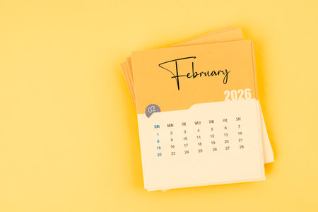 February 2026 calendar card on yellow background with copy space.の写真素材