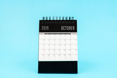 October 2026 Monthly desk calendar for 2026 year on blue color background.の写真素材