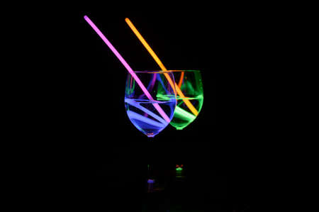 Colorful alcoholic beverages with dark background for party, new year, bar and christmas with straw...