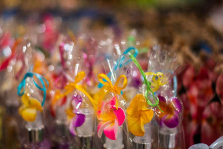 Colourful gift knots in souvenir shop during the christmas with nice decoration close up view